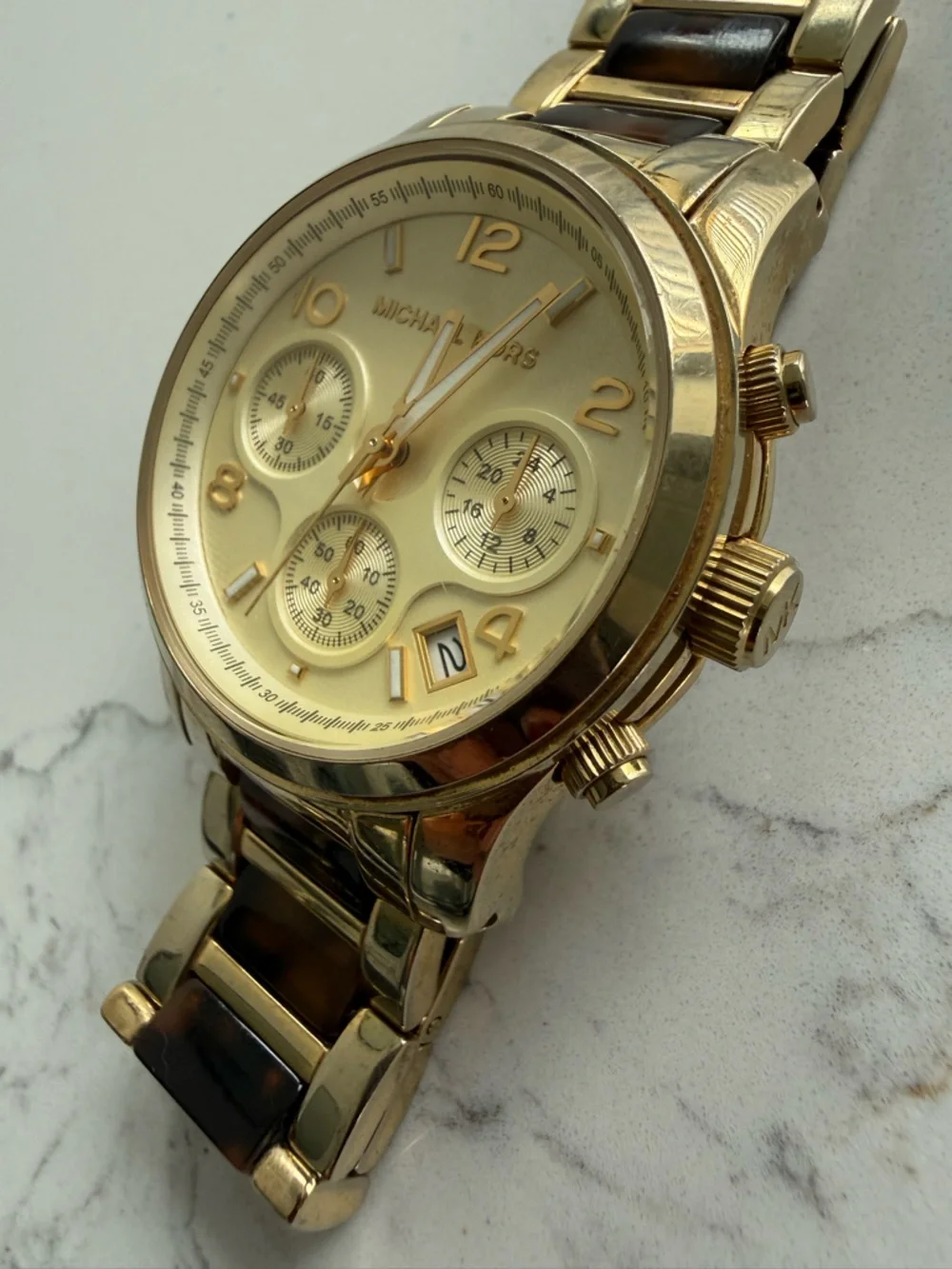 Michael Kors gold tone
