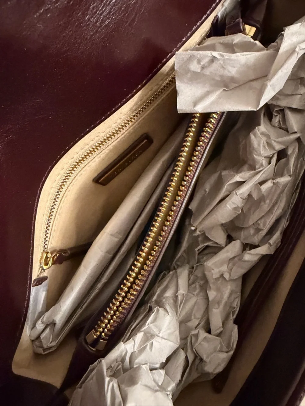 Tory Burch zip center