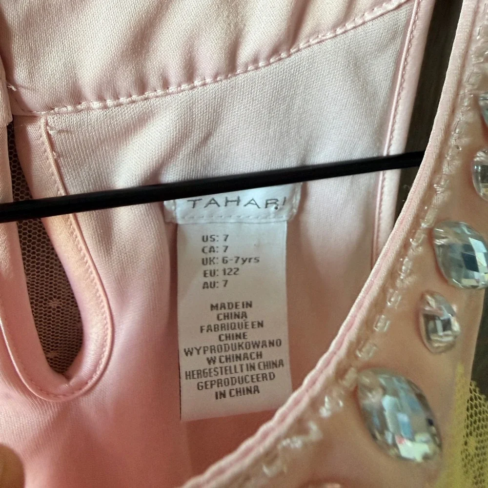 Tahari details brand