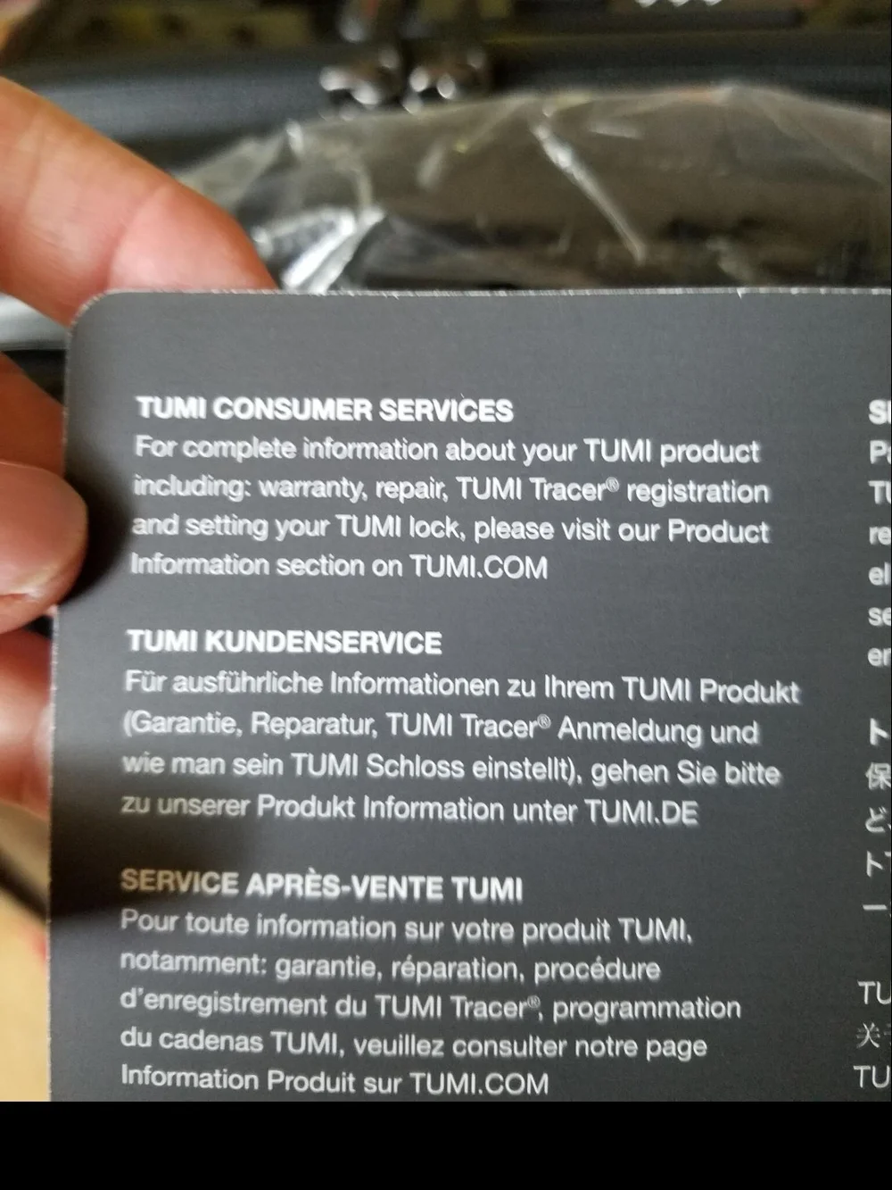TUMI International Expandable 4-Wheeled Carry-On - Black