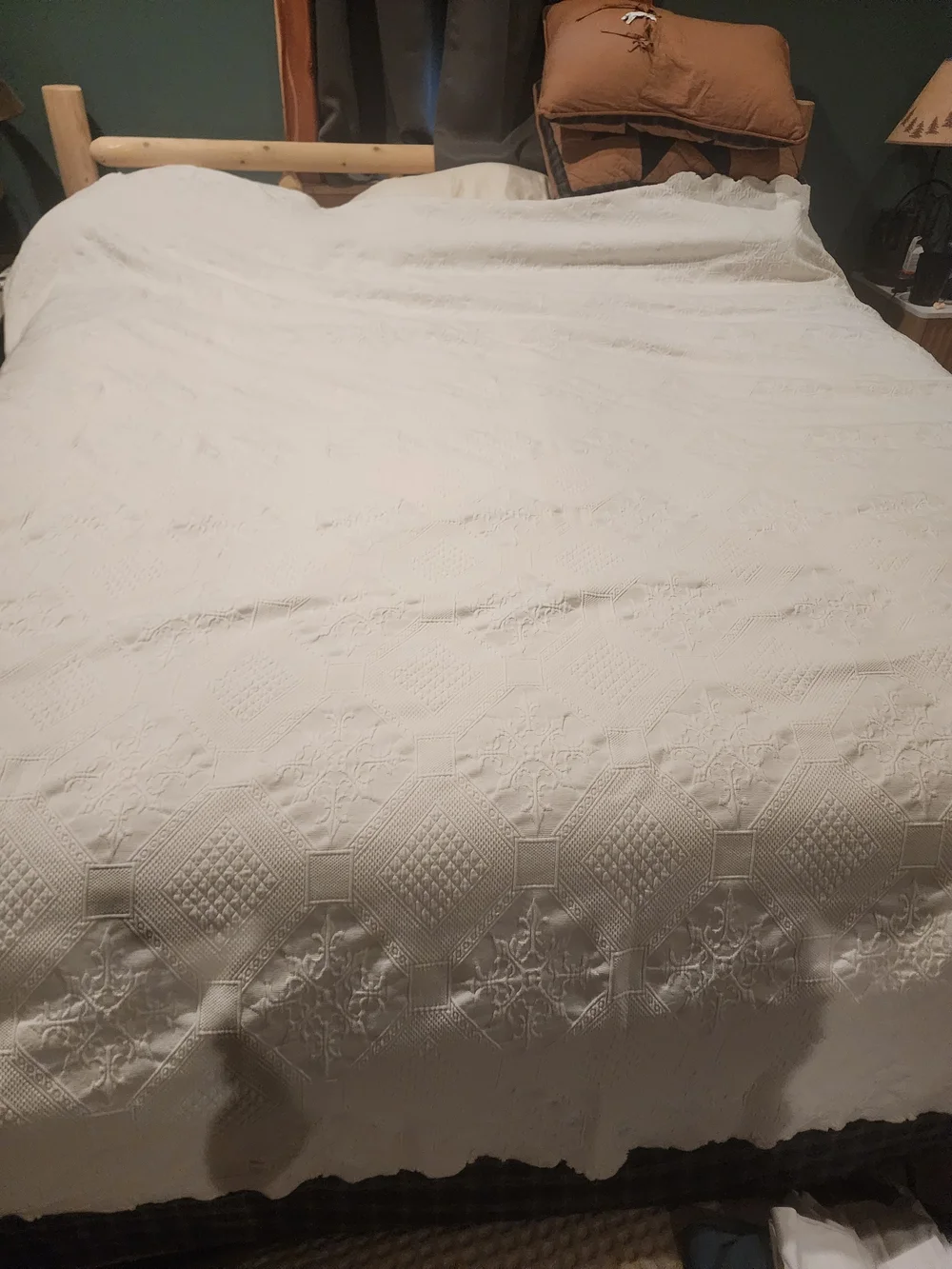 White Peacock Alley Oasis coverlet features a textured matelassé design