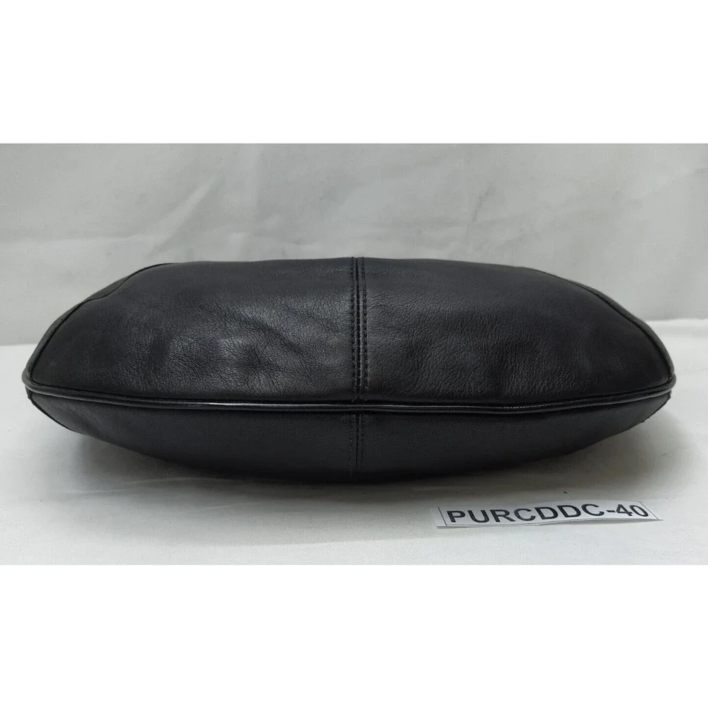 Coach stained black