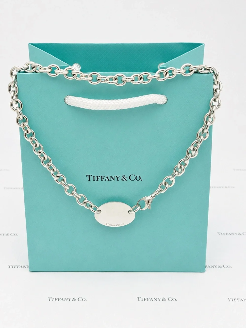 Tiffany & Co. signature firm