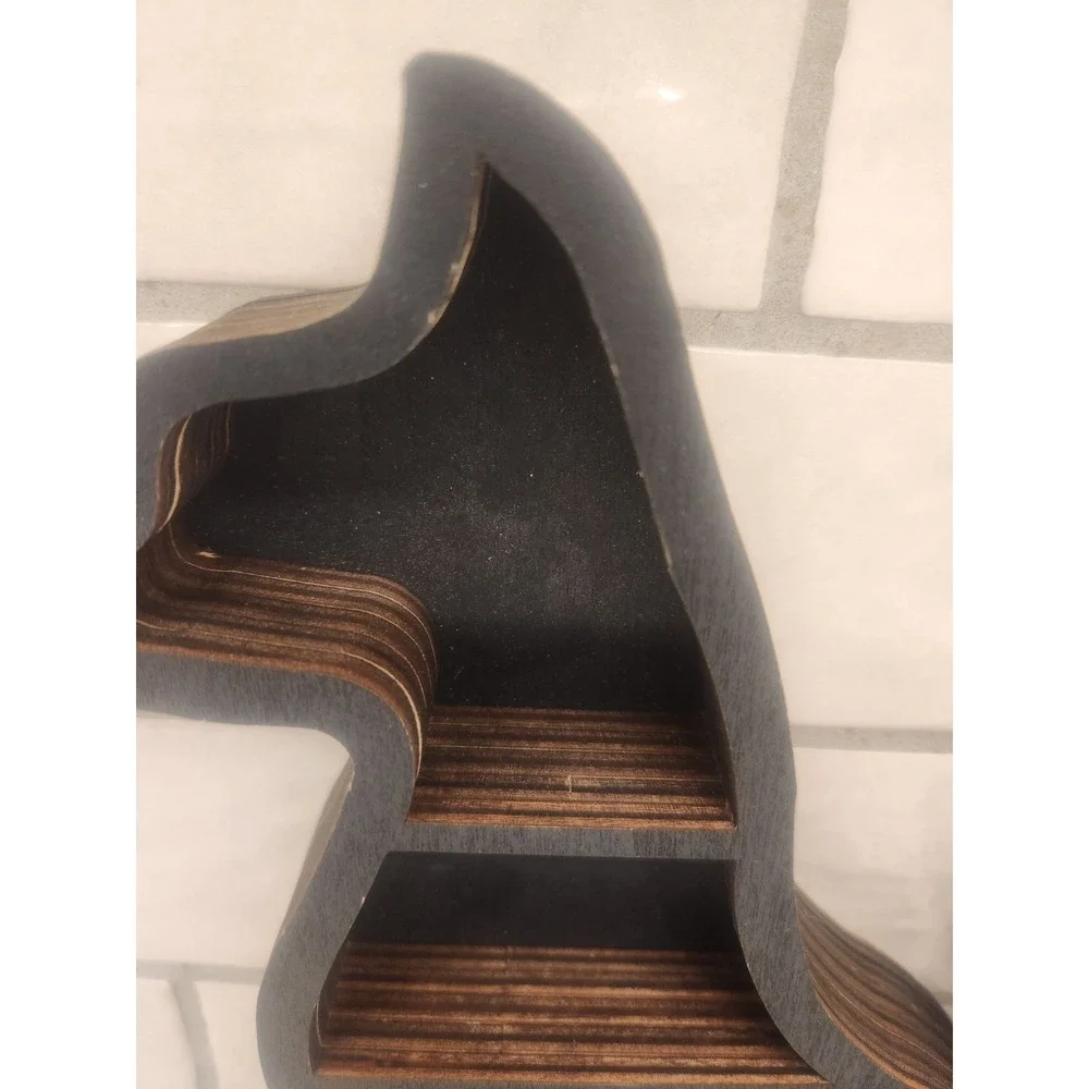 The Unbranded Brand black sitting