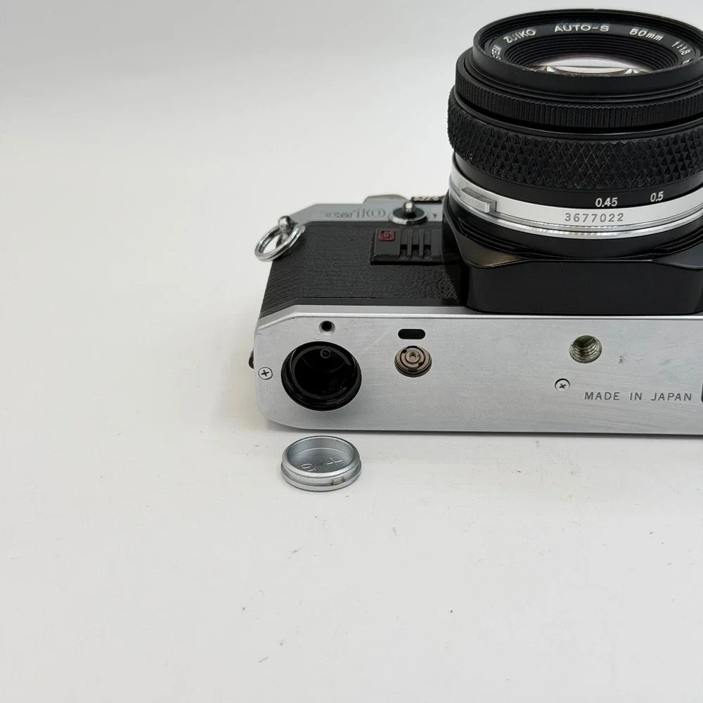 Olympus OM10 35mm Film SLR Camera with Zuiko Auto-S 50mm f1.8 Lens Silver Black