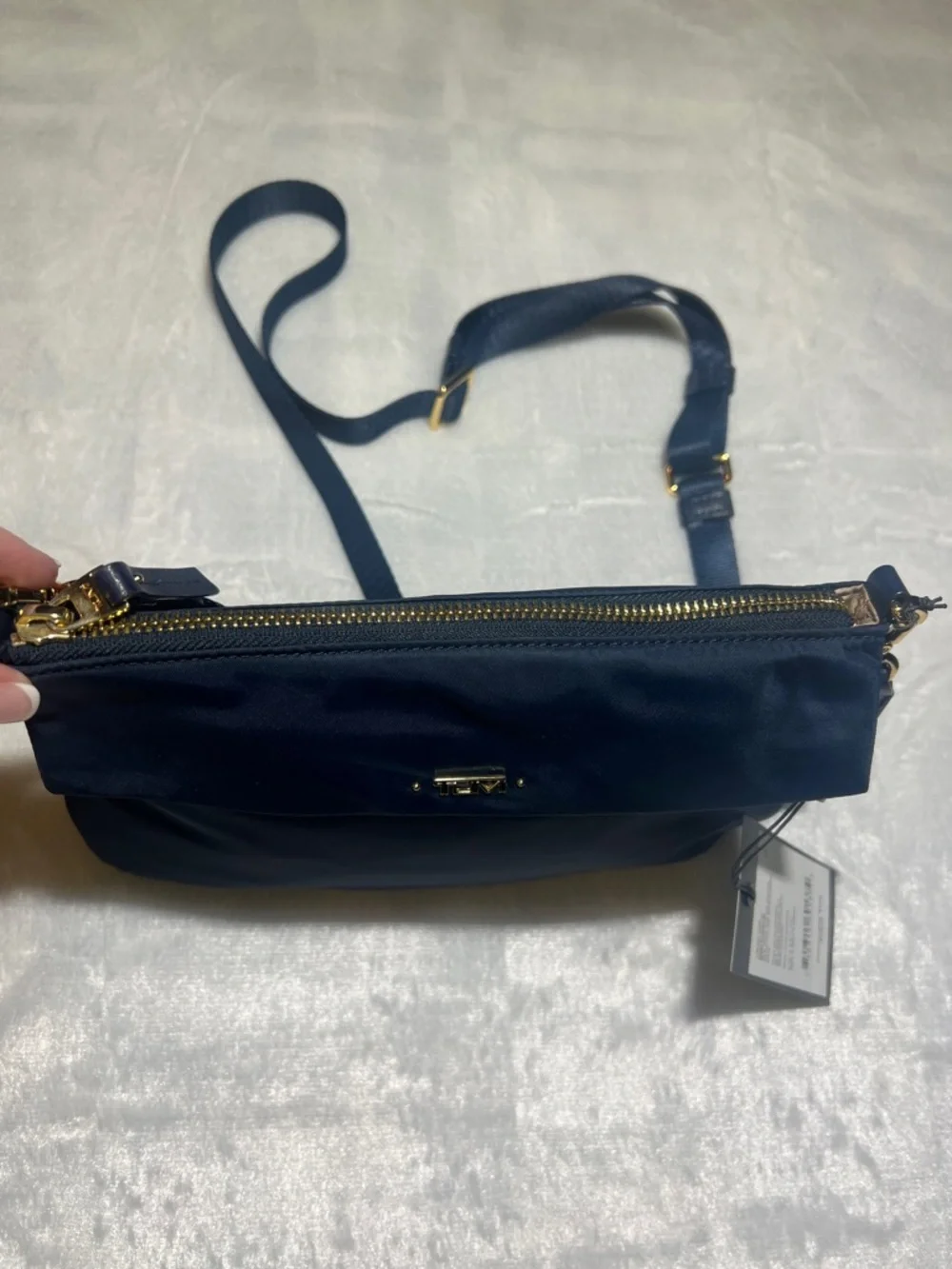 Tumi compact crossbody