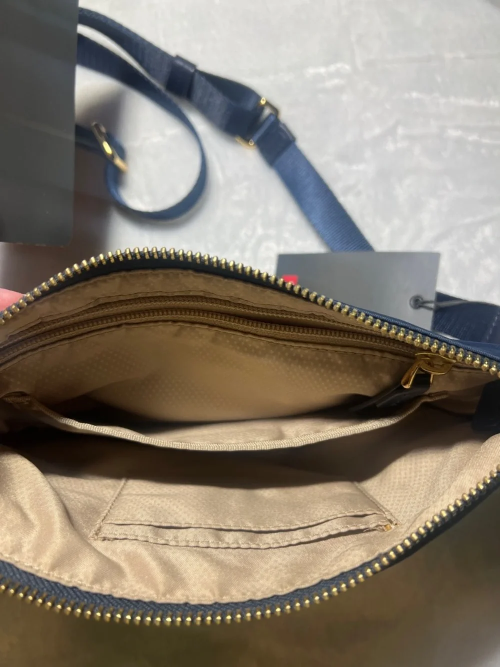 Tumi compact crossbody