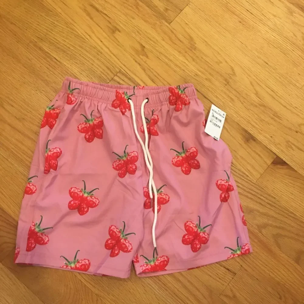 Petals and Peacocks small pink butterfly swim short trunks