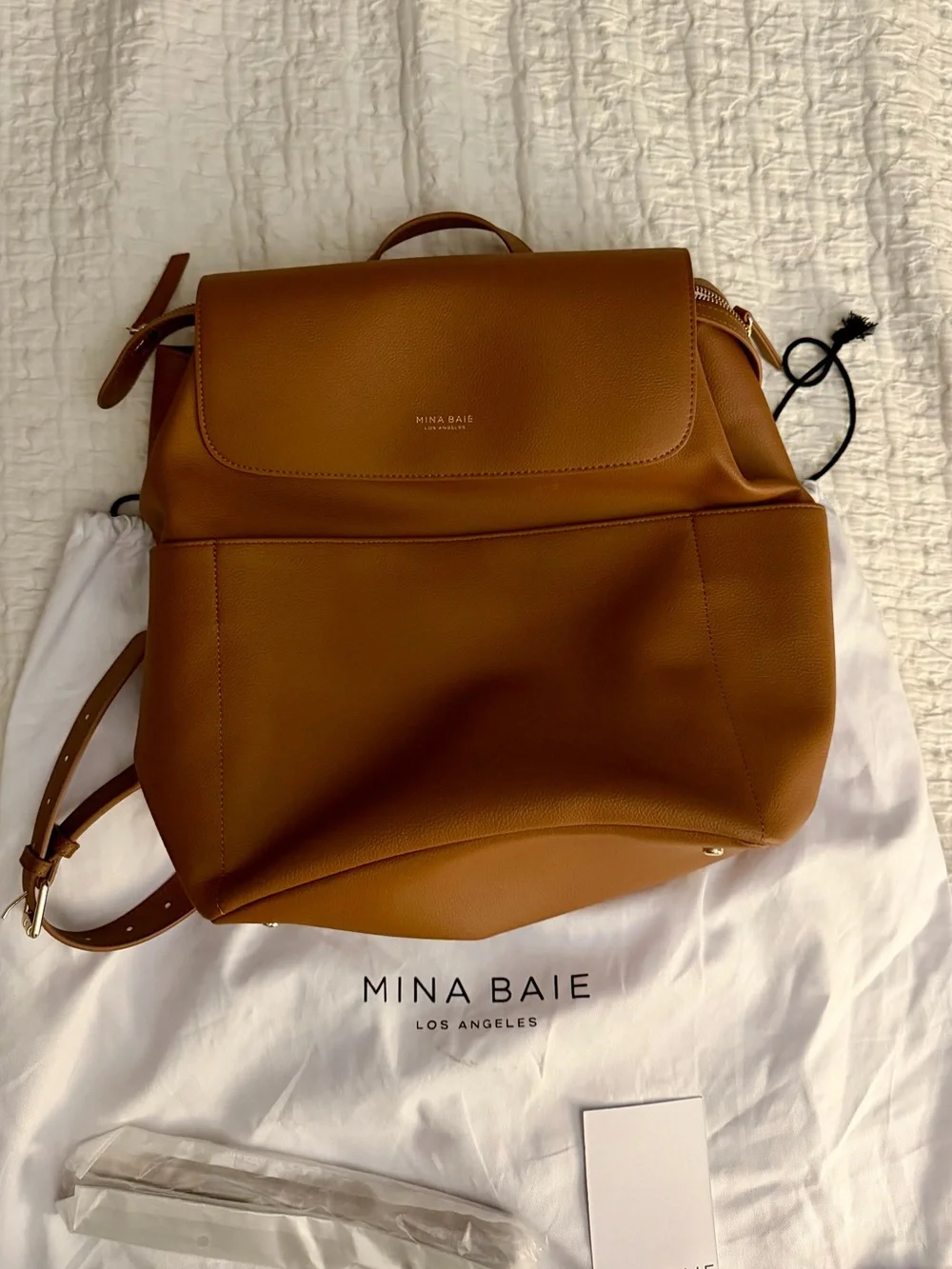 Mina Baie pairs laptop regular