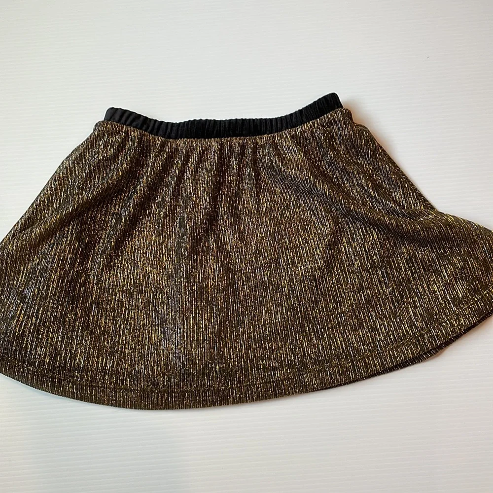 Old Navy gold and black short skirt.  Girl’s size 8