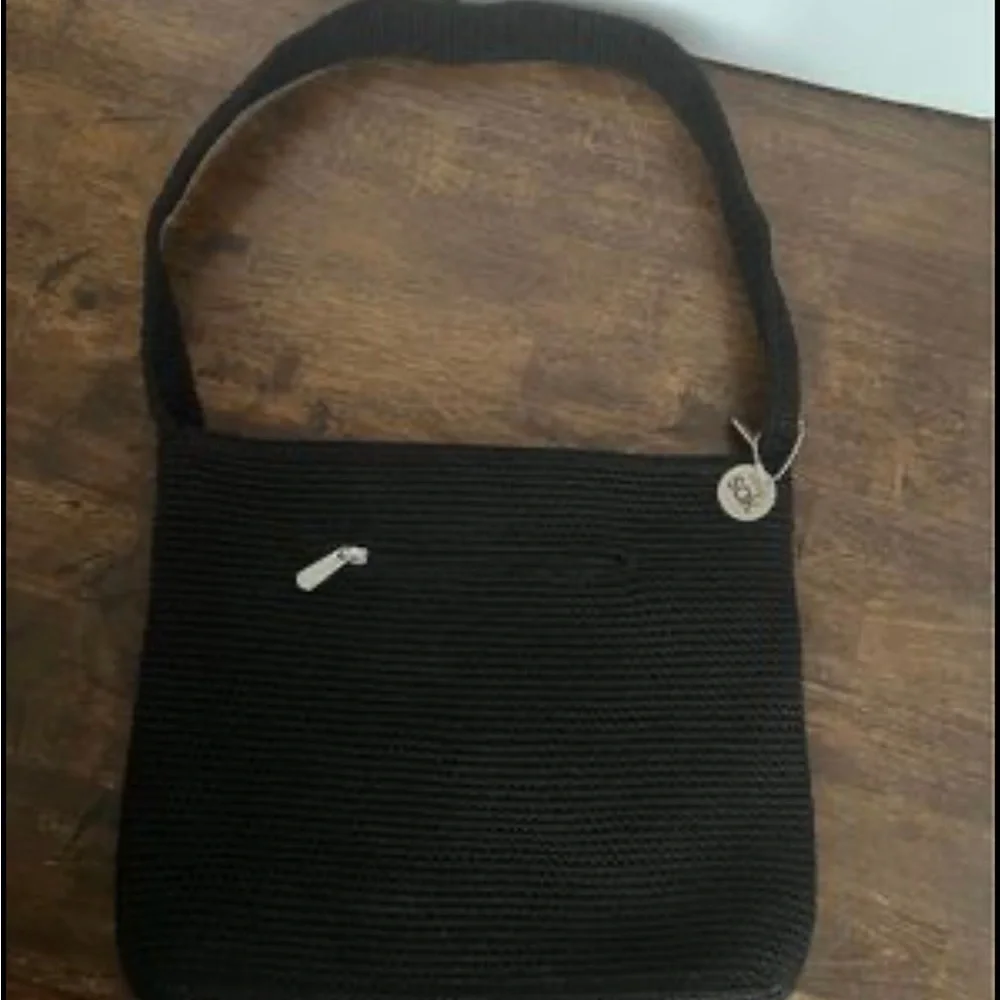 SAK single strap shoulder bag