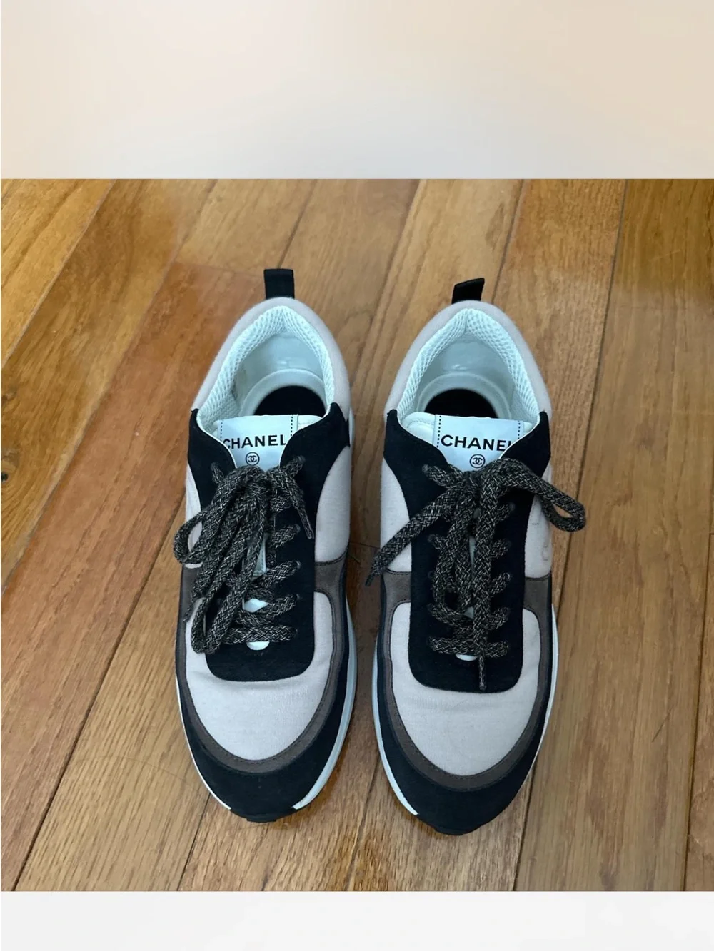 CHANEL Black and Beige Low-Top Logo Sneakers