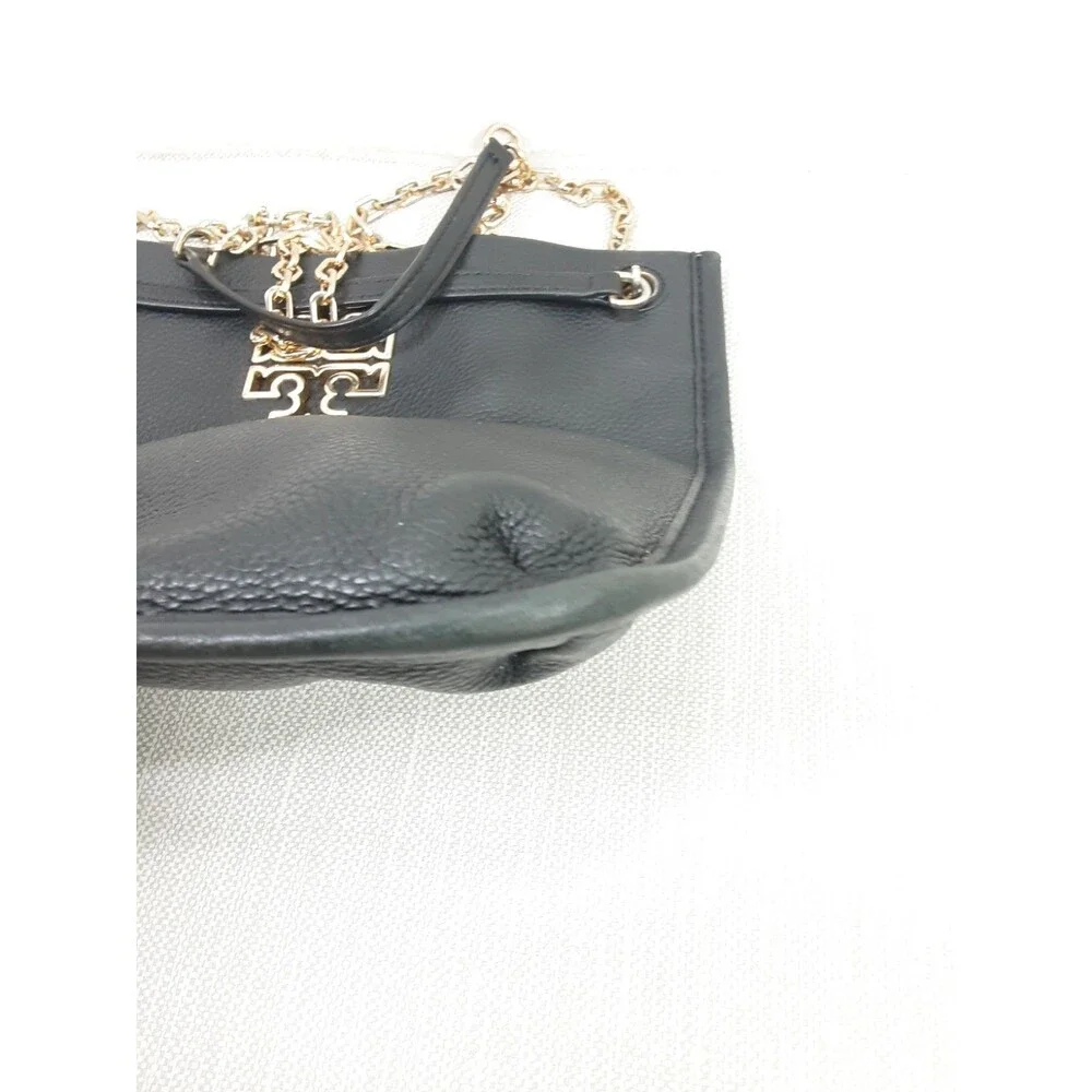 Tory Burch or mark edges