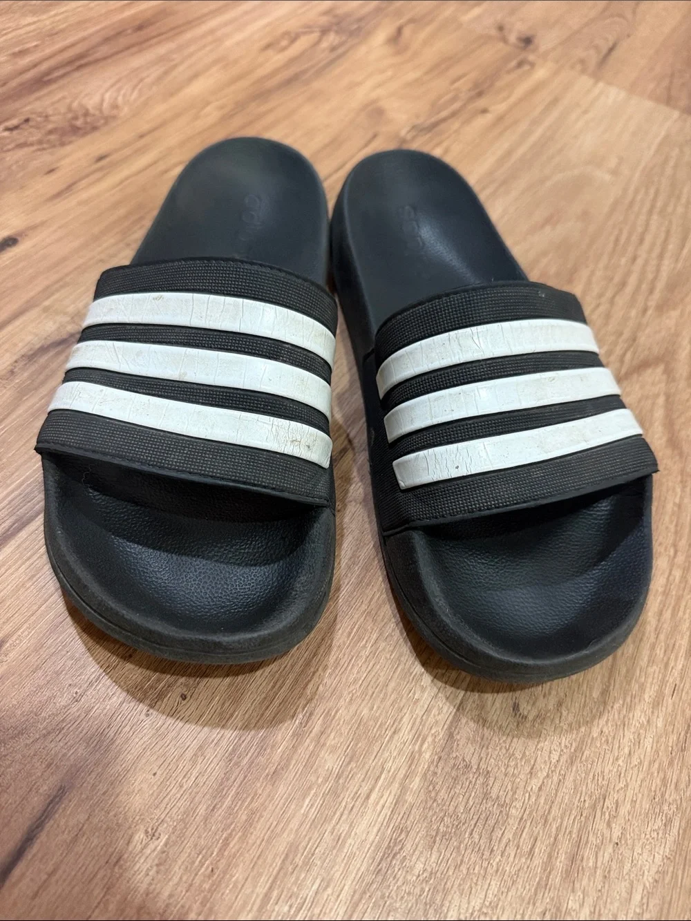 Men’s size 11 adidas Black Slides with White Three-Stripes