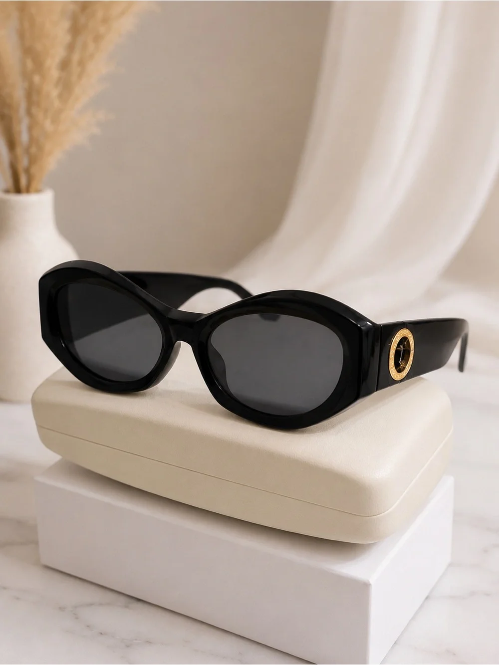 Black Women's Oversized Oval Sunglasses with Gold Accent