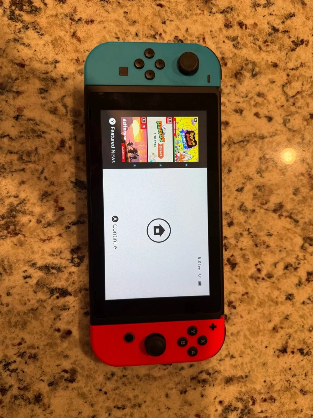 Nintendo Switch with Blue and Red Joy-Con