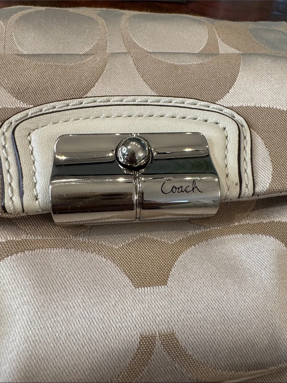 Coach Beige Signature Hobo Bag with Turn-Lock Pocket