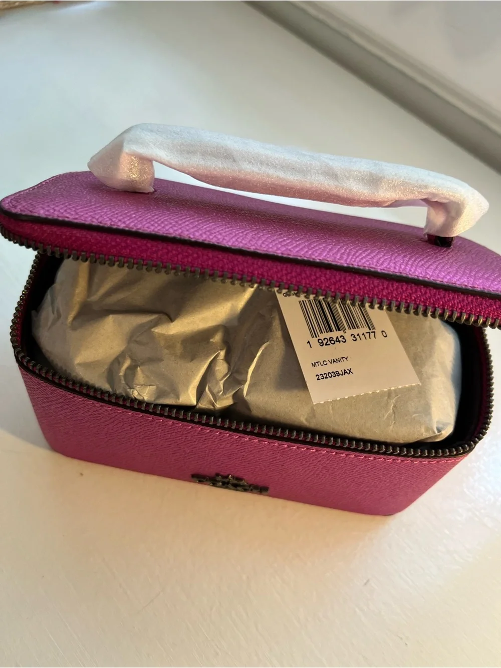 Coach zipper vibrant