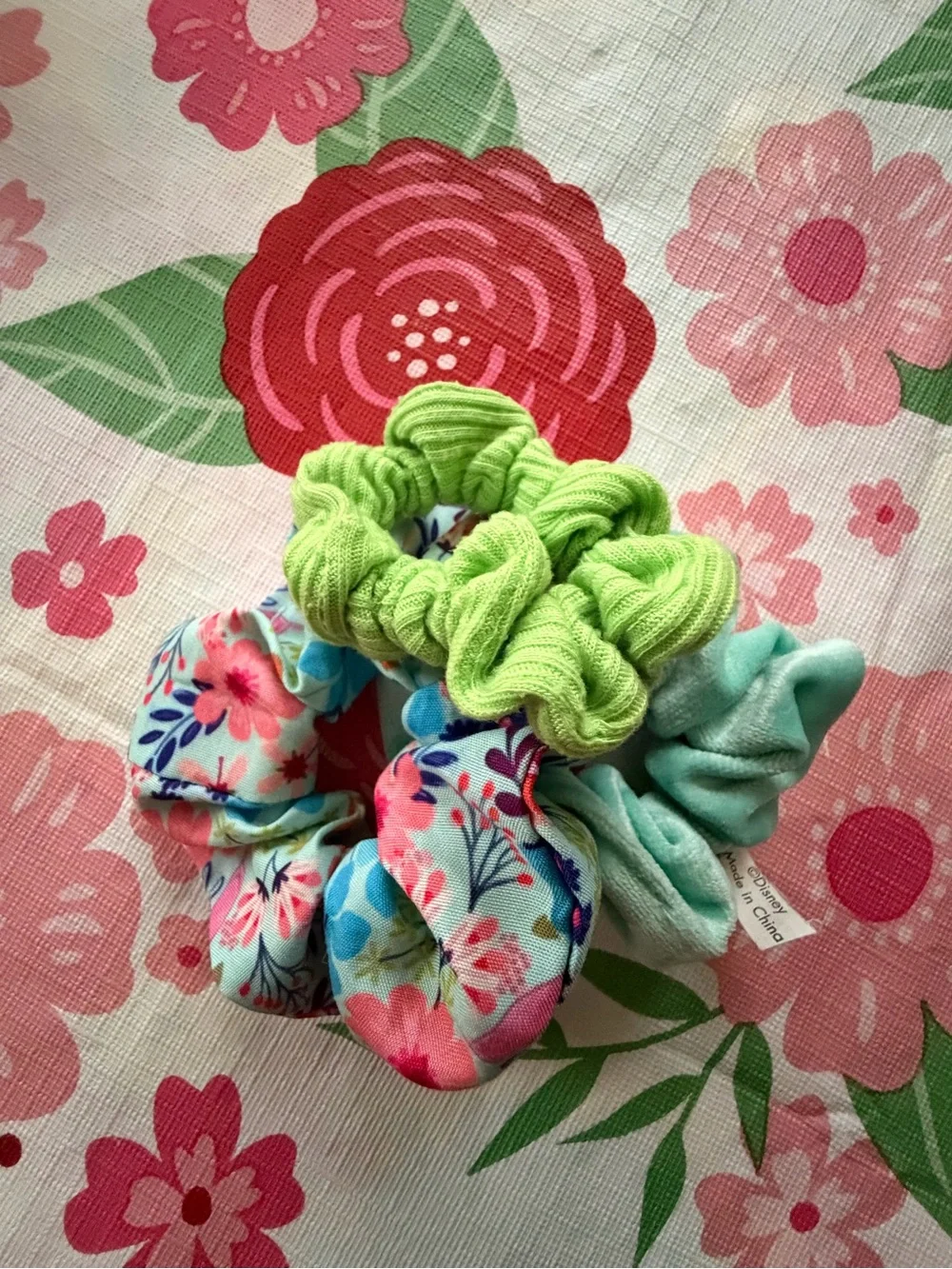 3 for the prices of 1 floral and plain scrunchies .