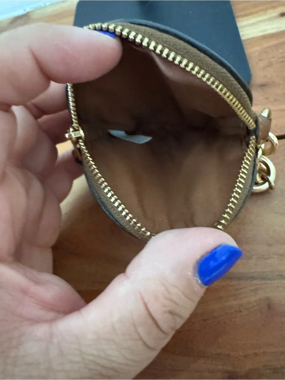 Coach gold tone
