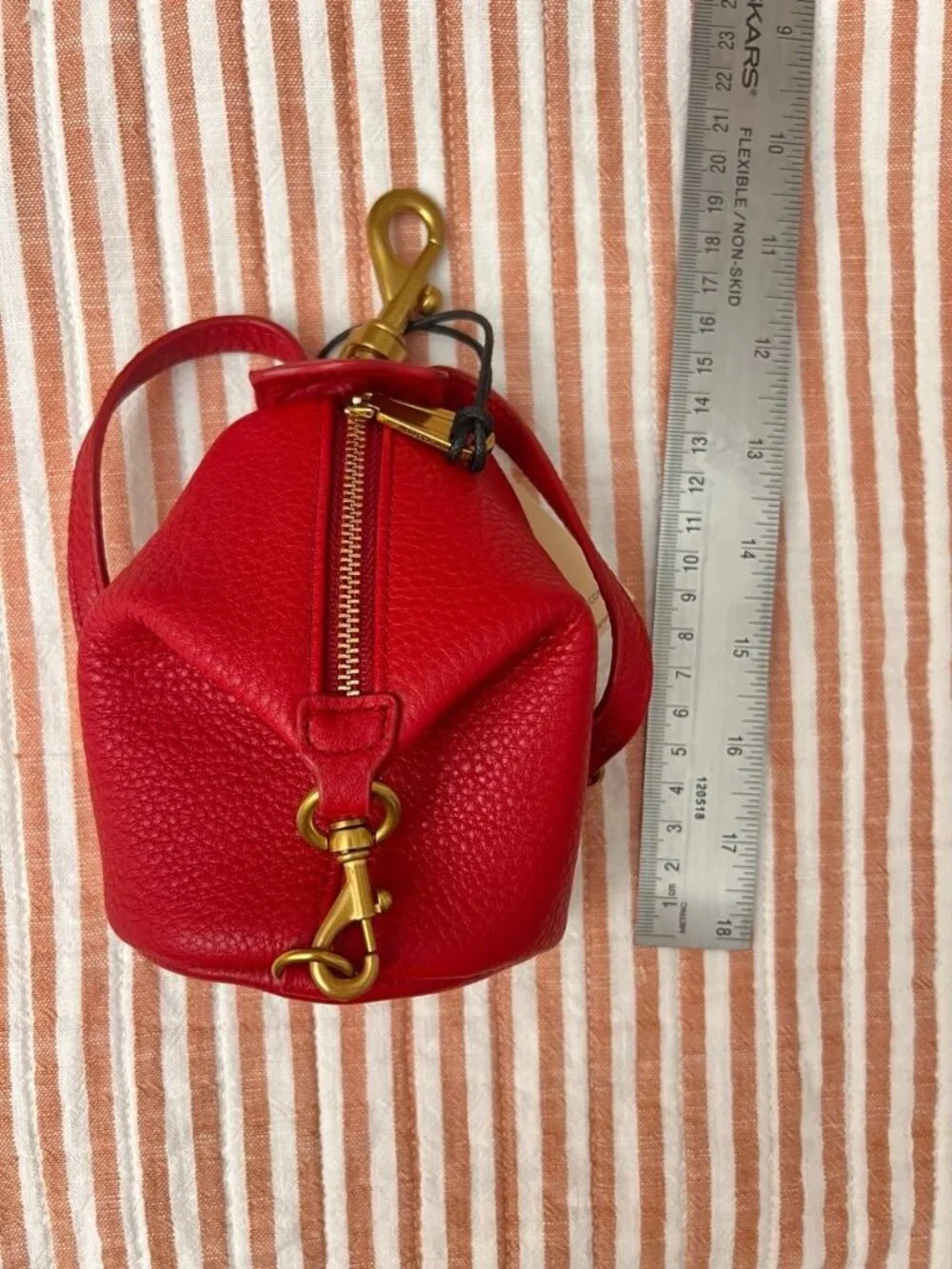Rebecca Minkoff red comes one