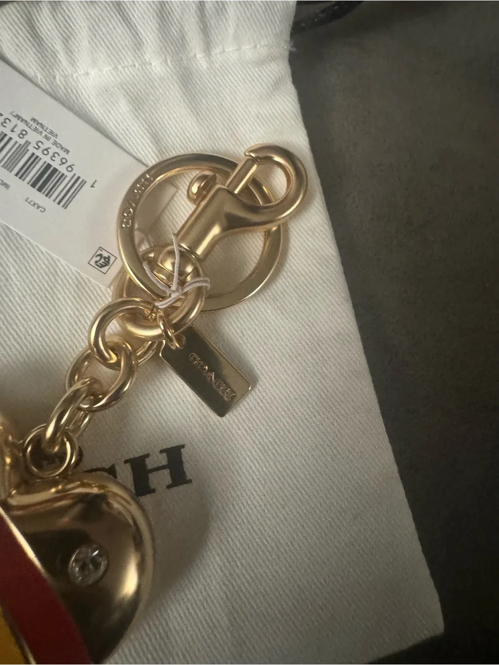 Coach gold tone