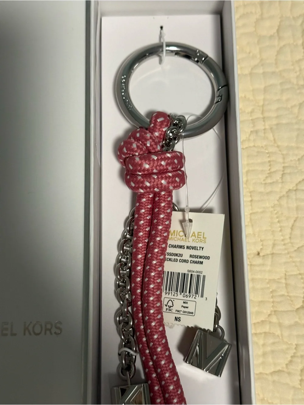 Michael Kors dots featuring accents
