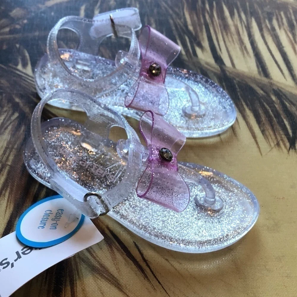 🆕 Carter’s Selena sparkly bow clear j…