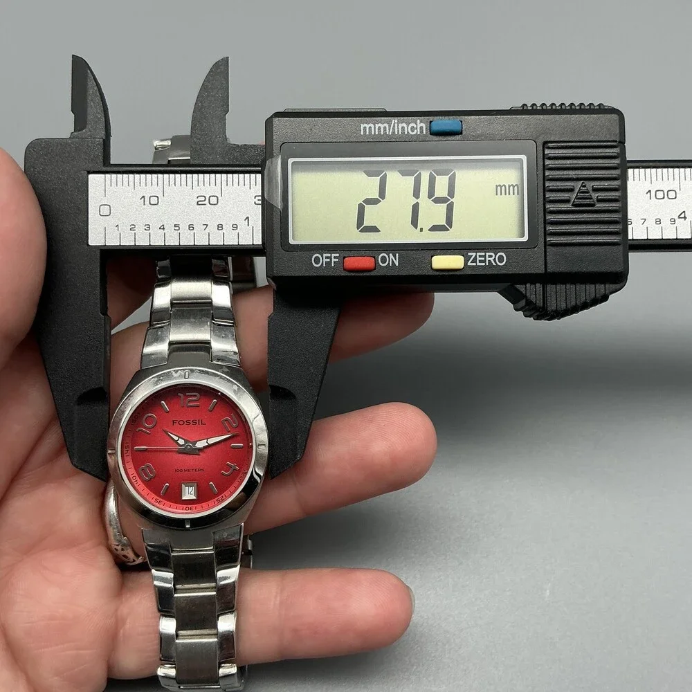 Fossil 100 am