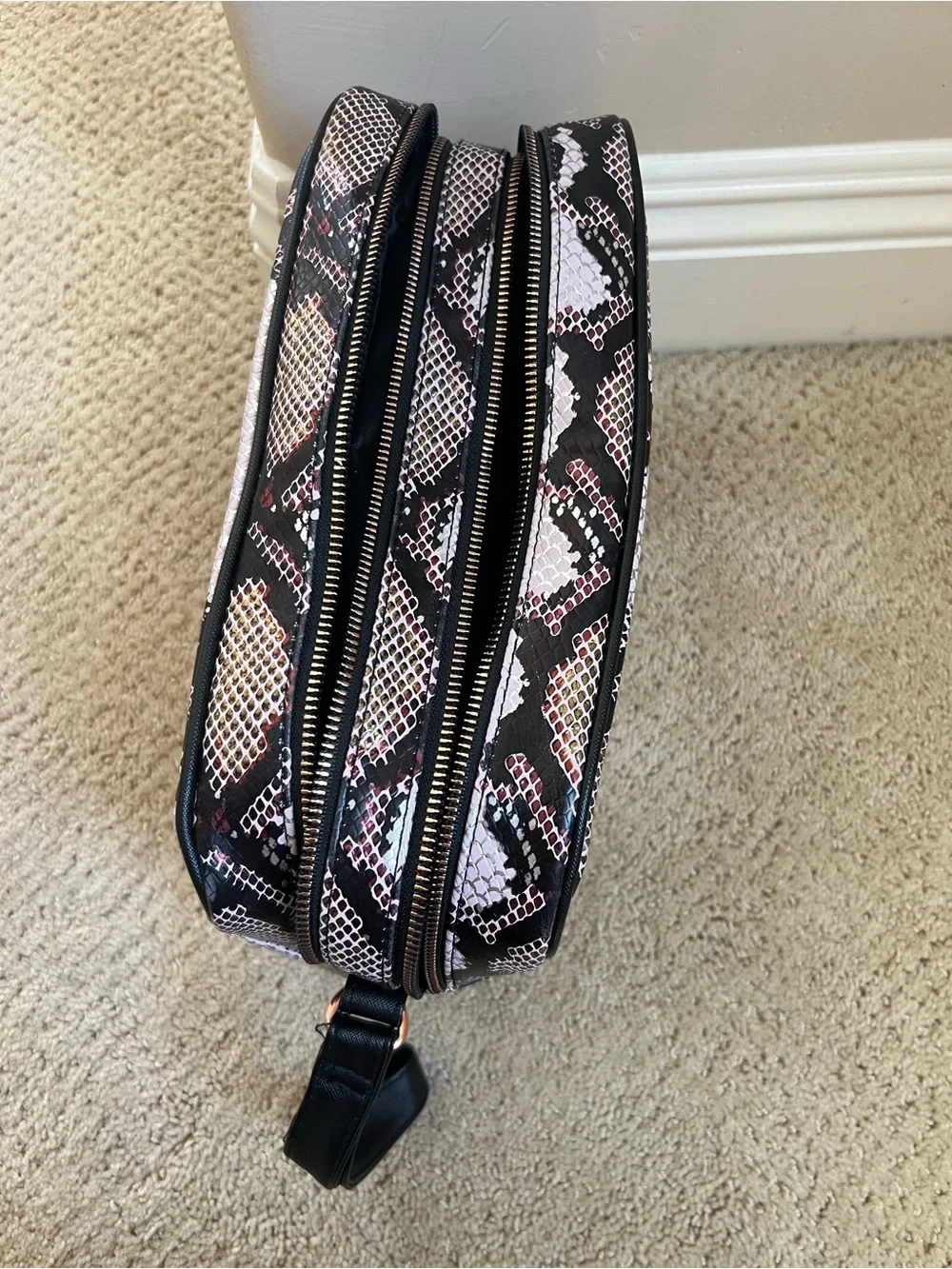 Nicole Miller stylish snake