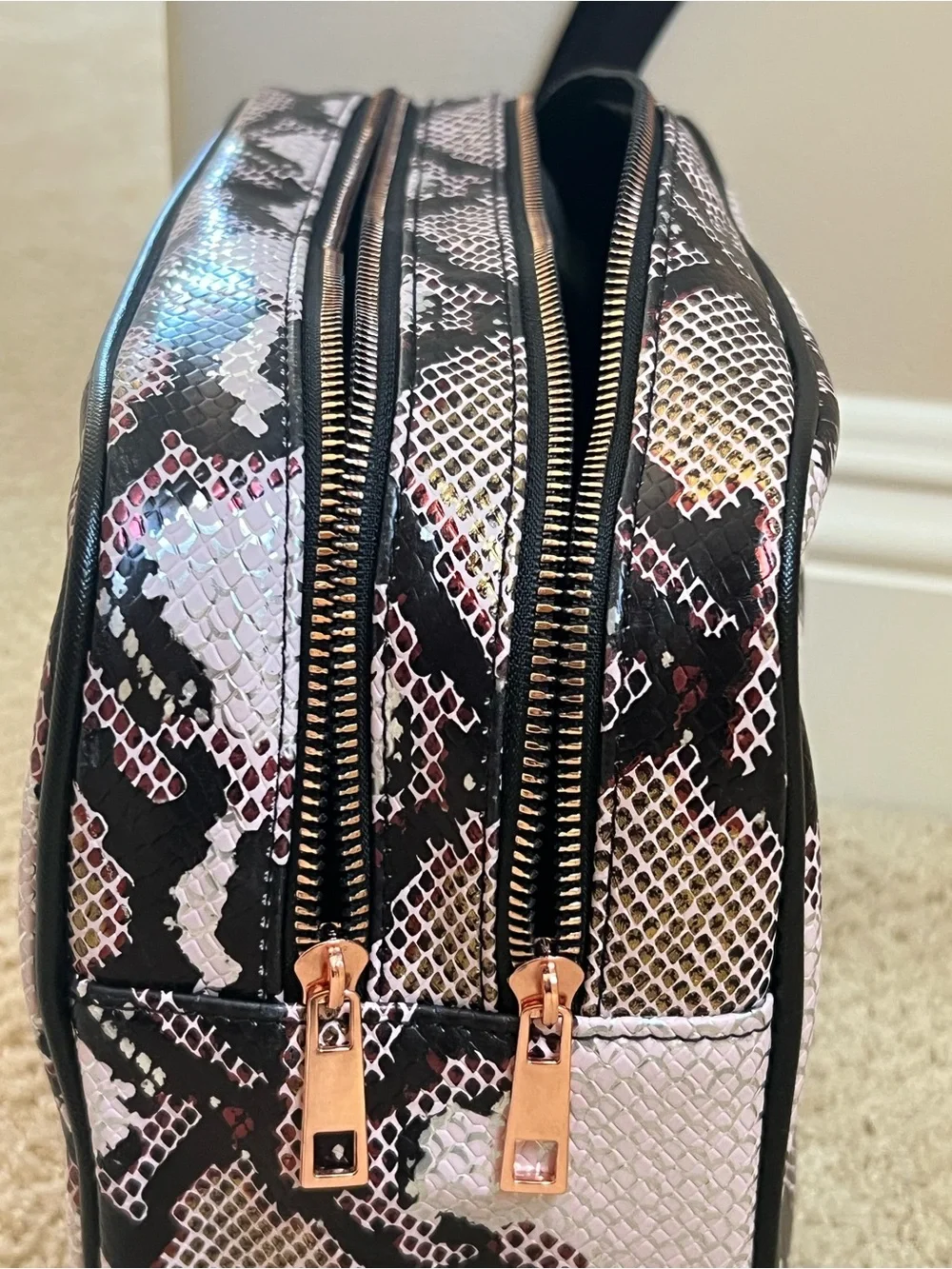 Nicole Miller stylish snake