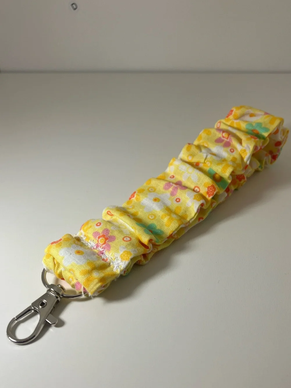 Daisymaeshop floral scrunchie wristlet. Handmade by me. In retro floral