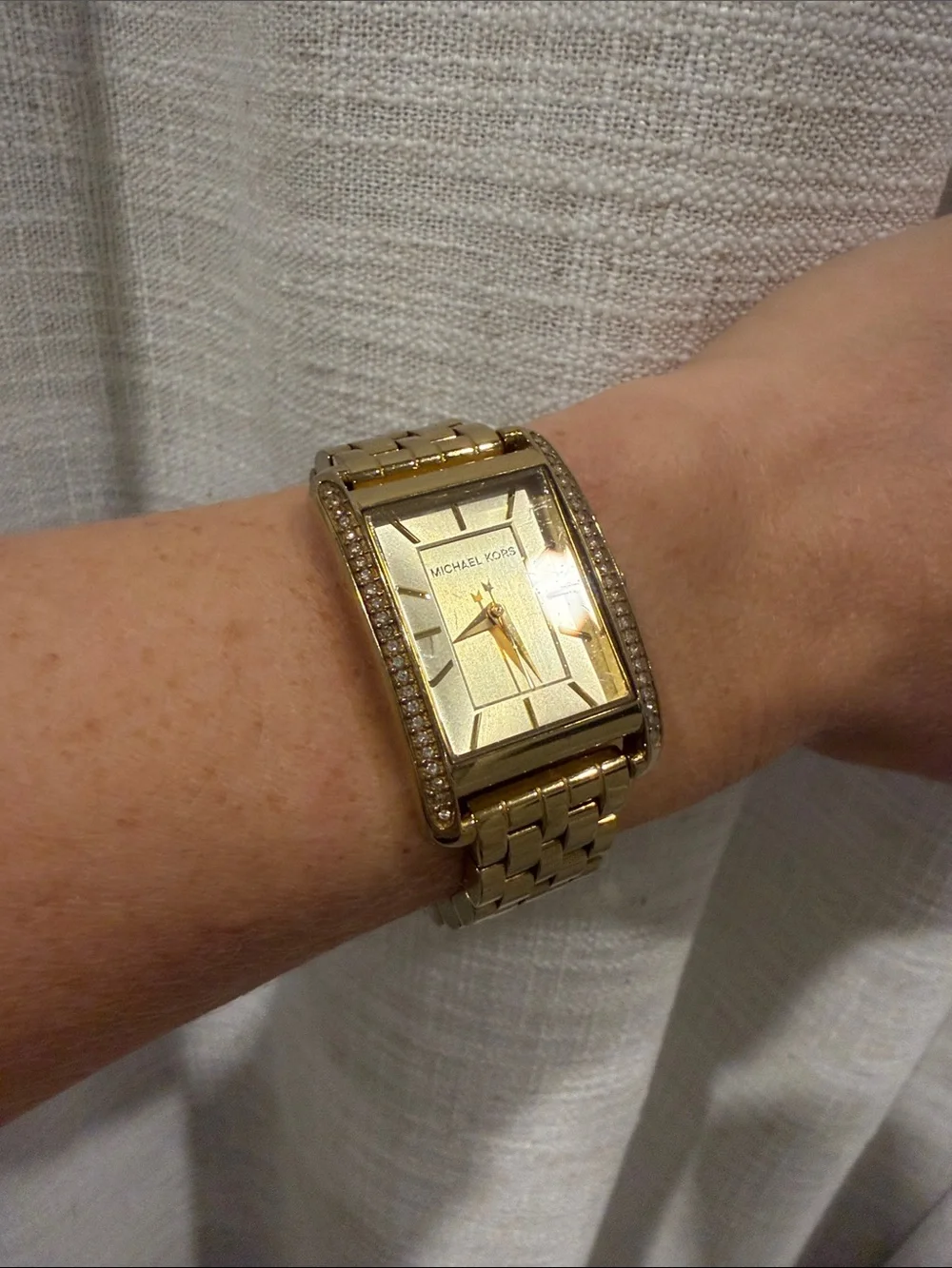 Michael Kors gold tone
