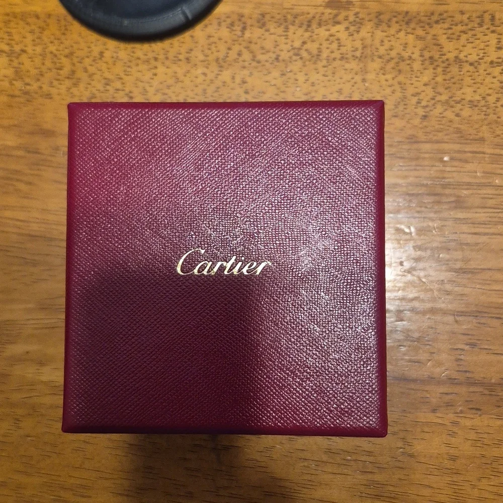 Cartier comment below leave