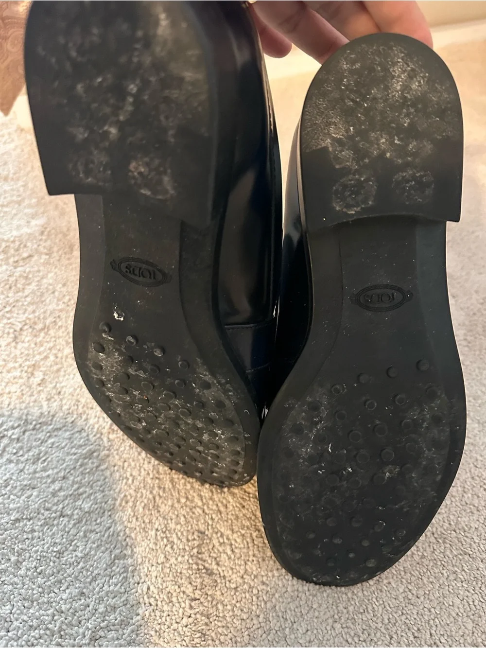 Tod's Black Leather Kiltie Penny Loafers