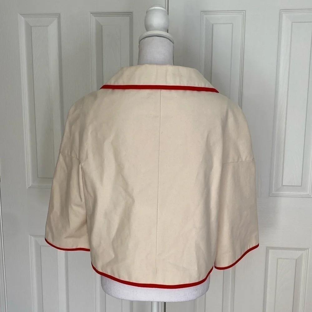 Kate Spade- NWOT Ivory Canvas Cropped Jacket with Red Piping Trim