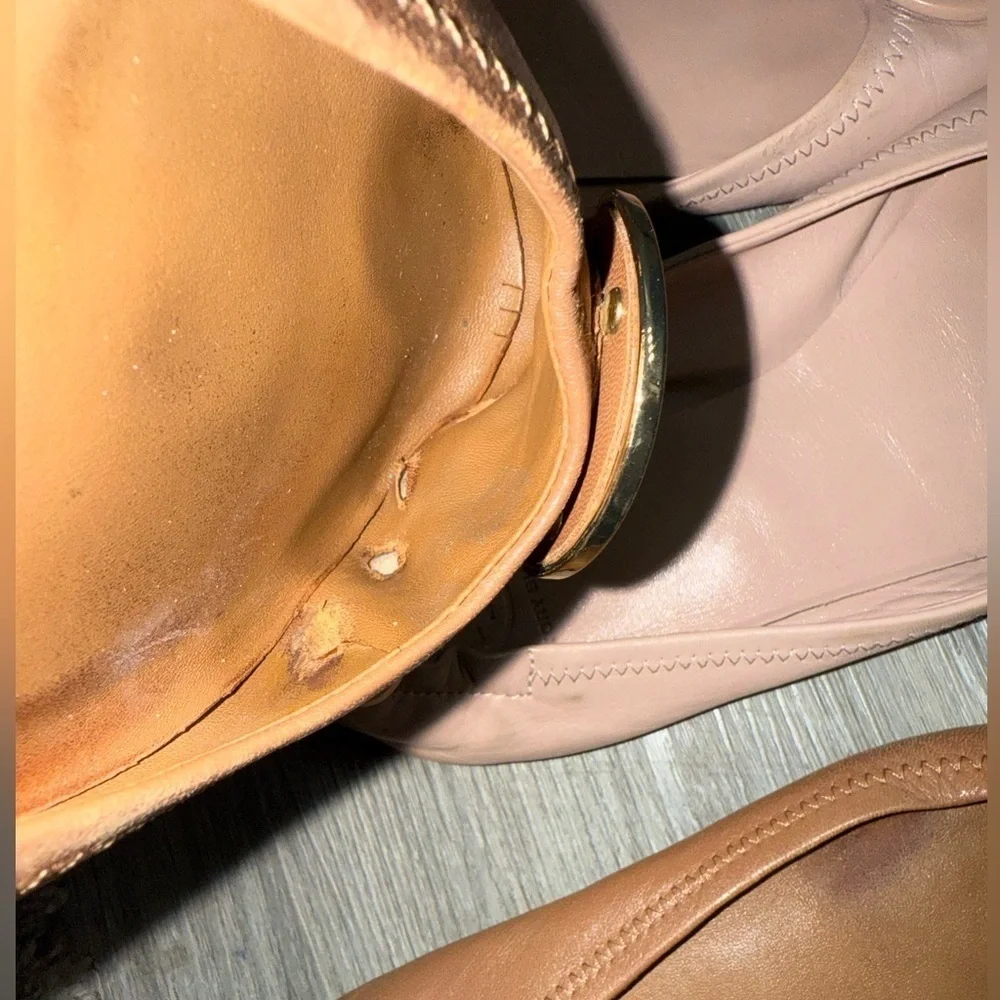 Tory Burch brick tan signs