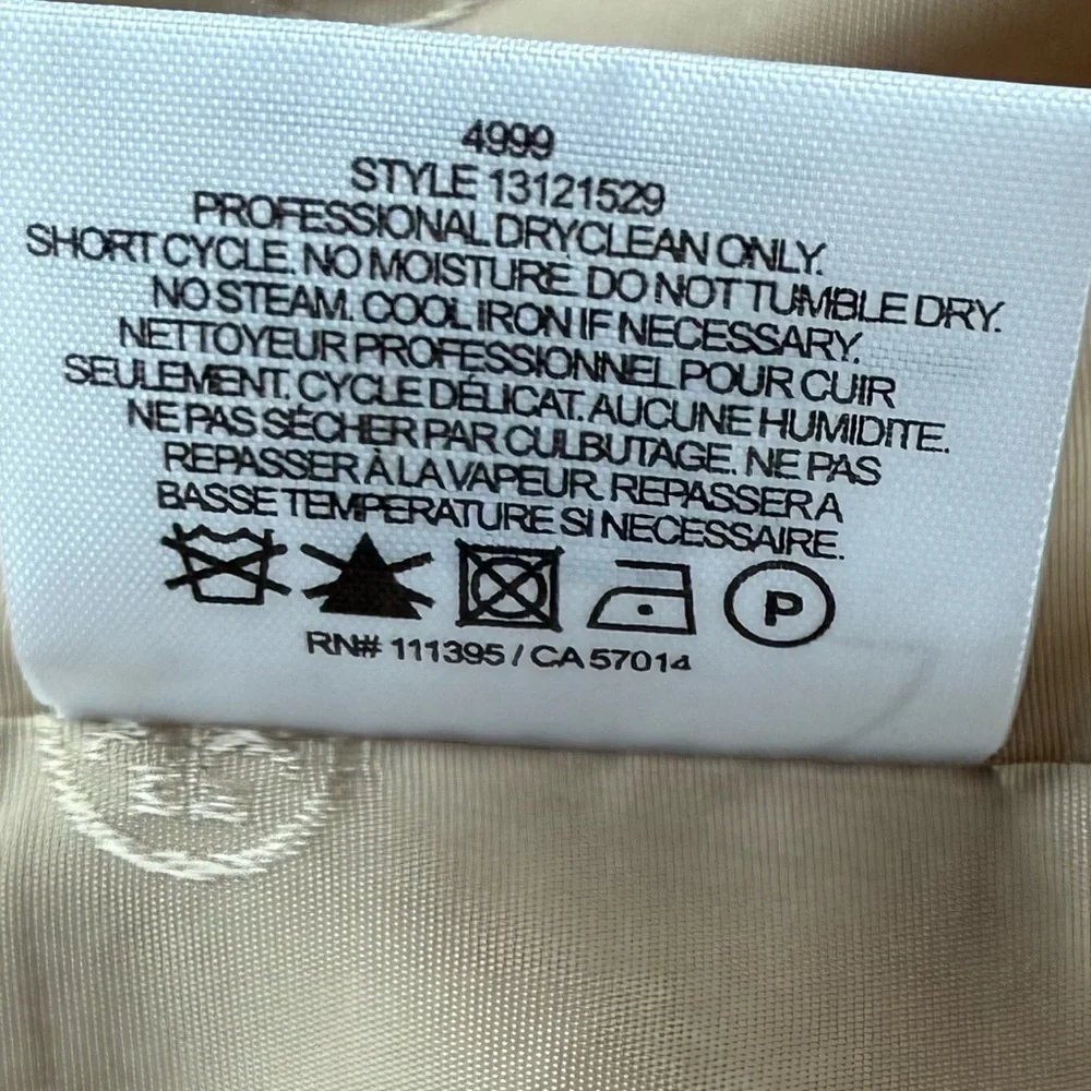 Tory Burch hem trim along