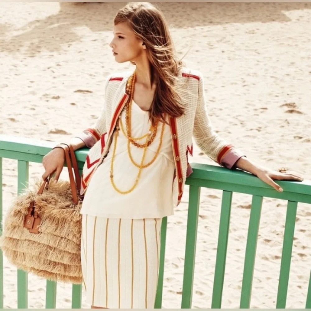 Tory Burch cuffs along purple