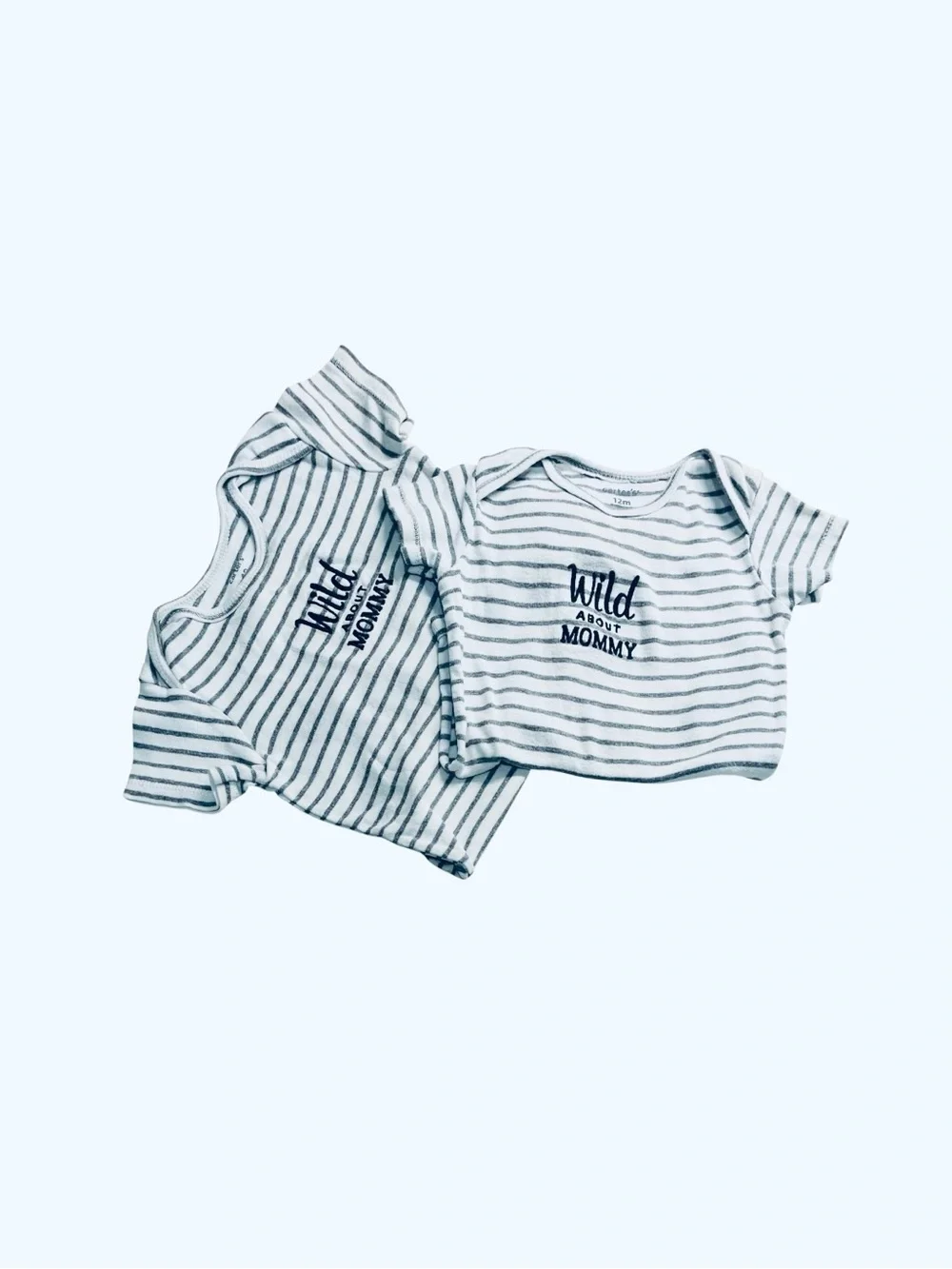 Carter’s cotton stripped onesie set 