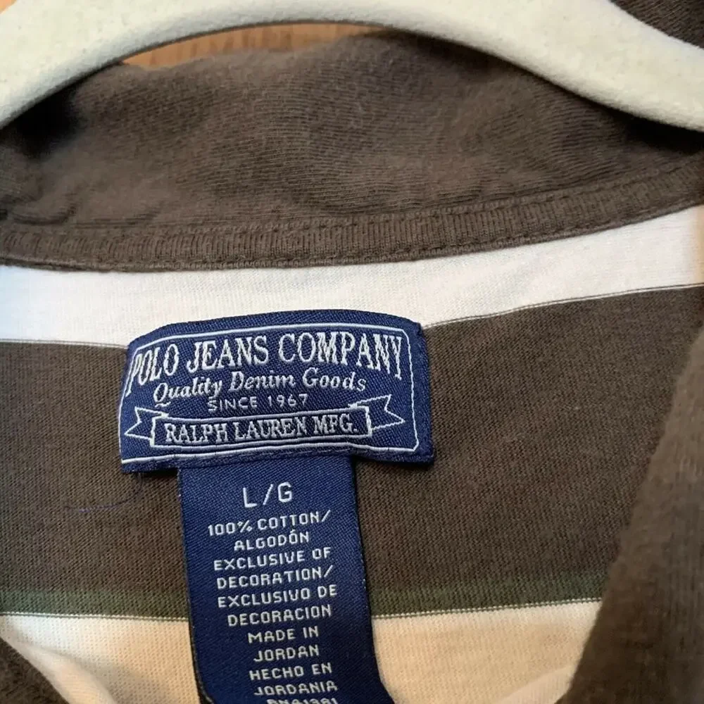 Ralph Lauren laying 27 flat