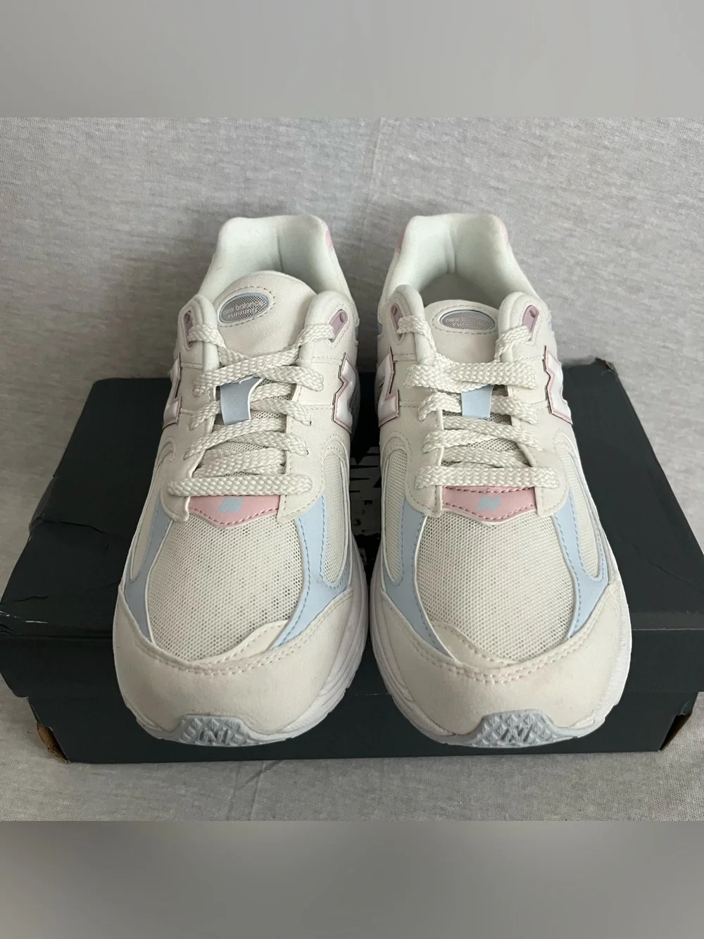 New Balance 2002 White Leather Sneakers with Pale Pink & Light Blue Accents