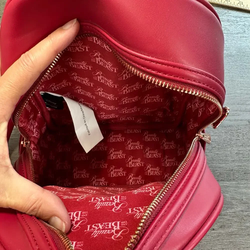 Loungefly Disney Beauty and the Beast Winter Scene Backpack Red