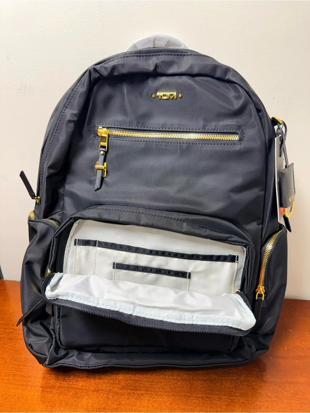Tumi Black Nylon Backpack with Gold-Tone Hardware