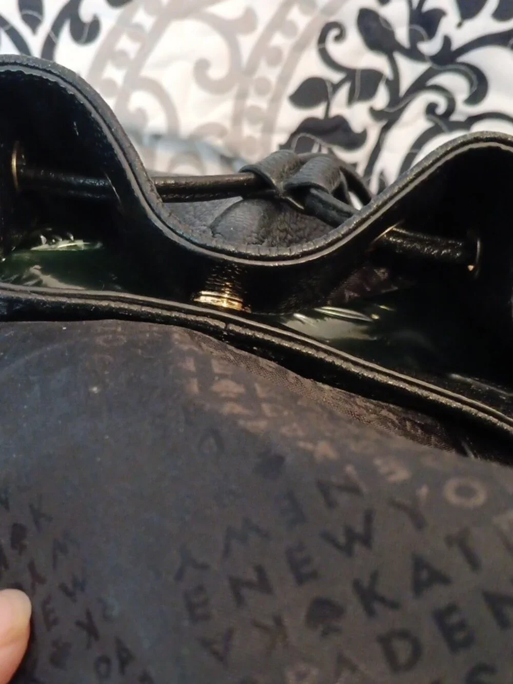 kate spade Black Pebbled Leather Drawstring Backpack