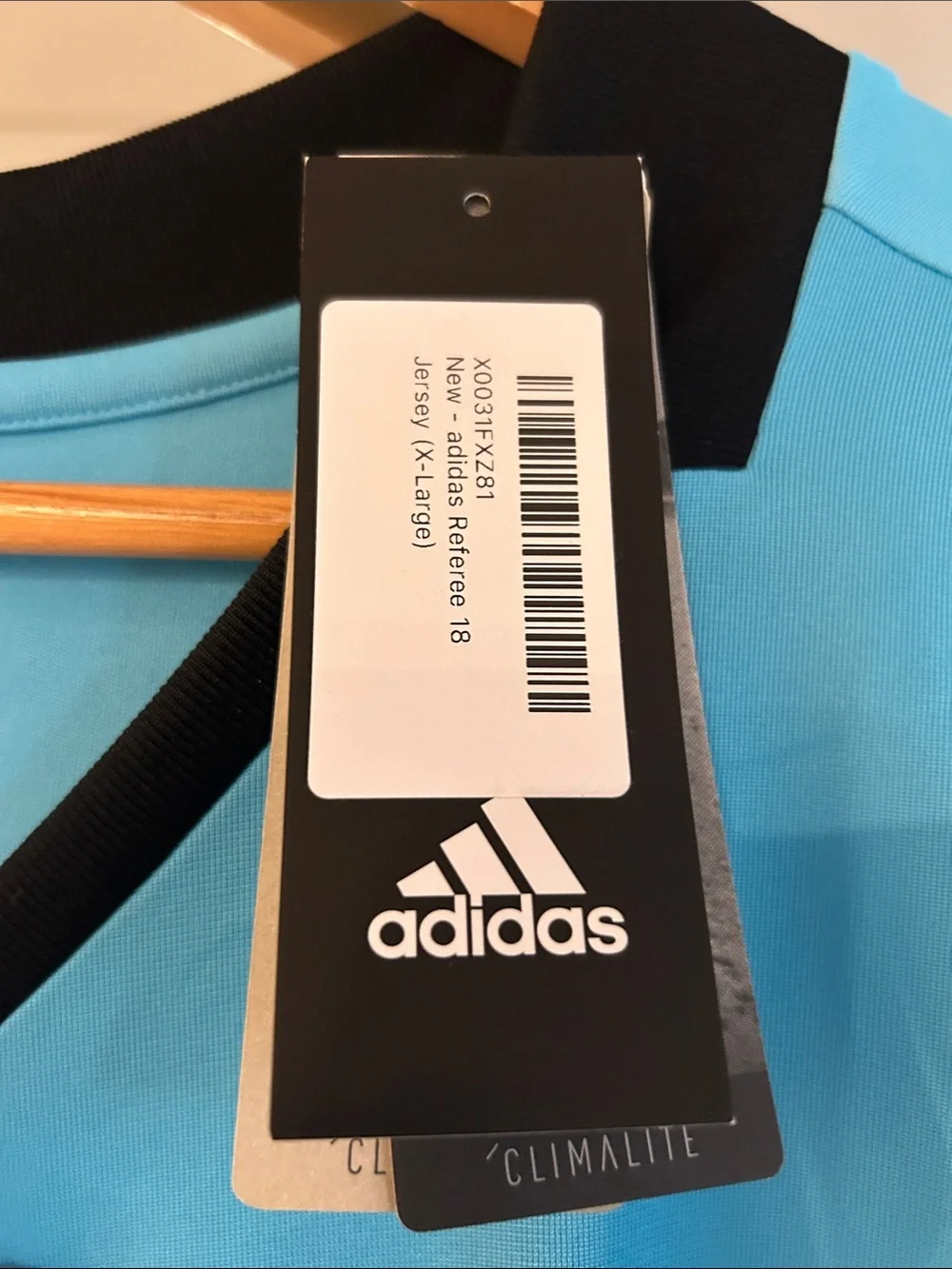 adidas Men’s Aqua Blue Short-Sleeve V-Neck Shirt with Black Trim