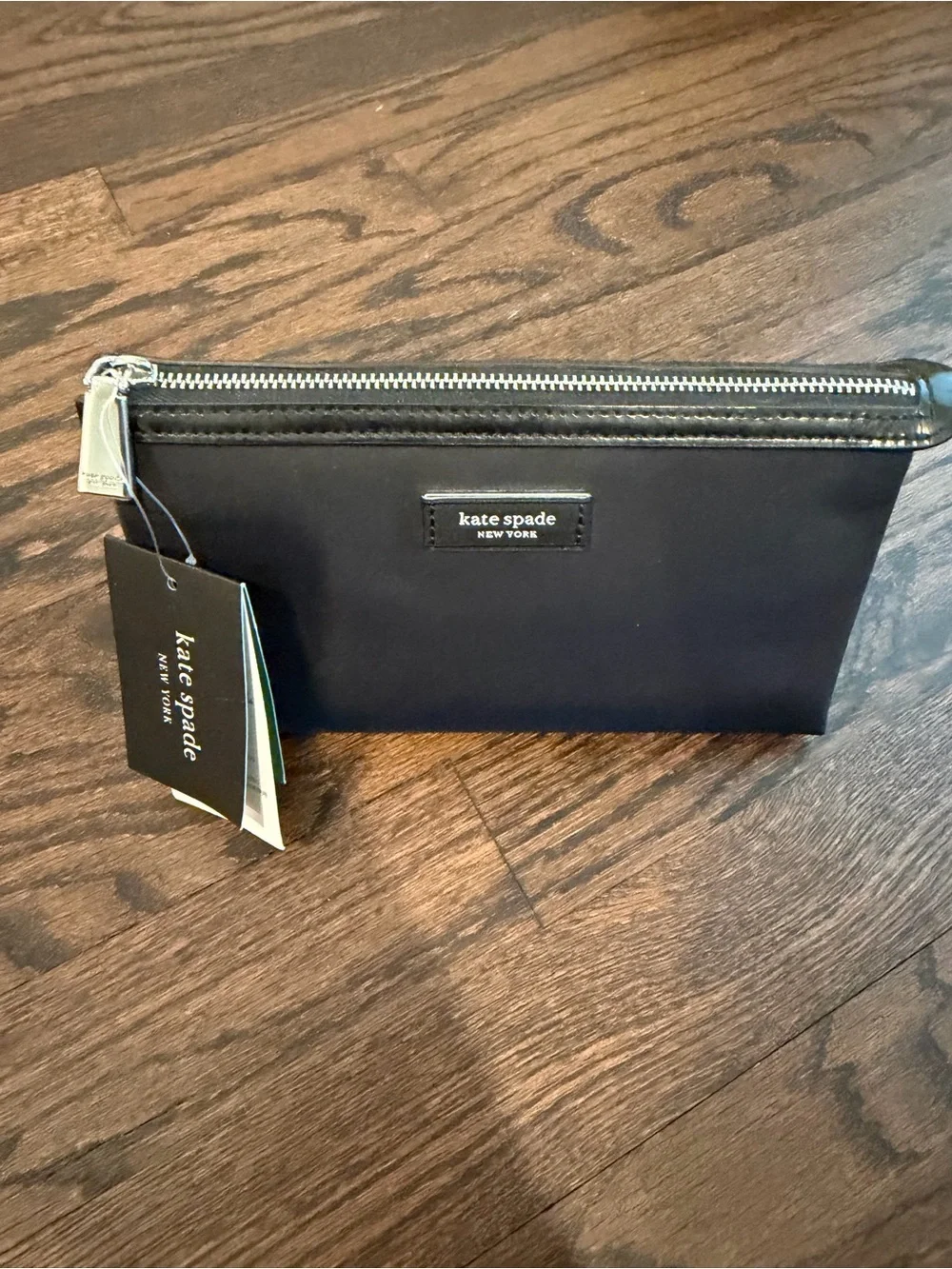 kate spade black toiletry pouch with zip-top