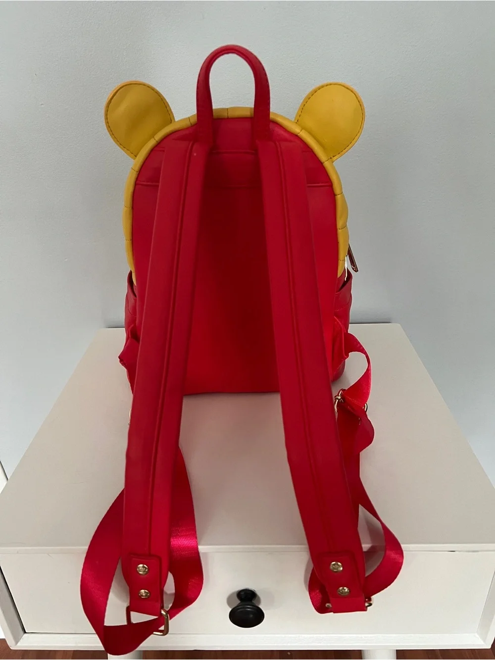 Loungefly features yellow red
