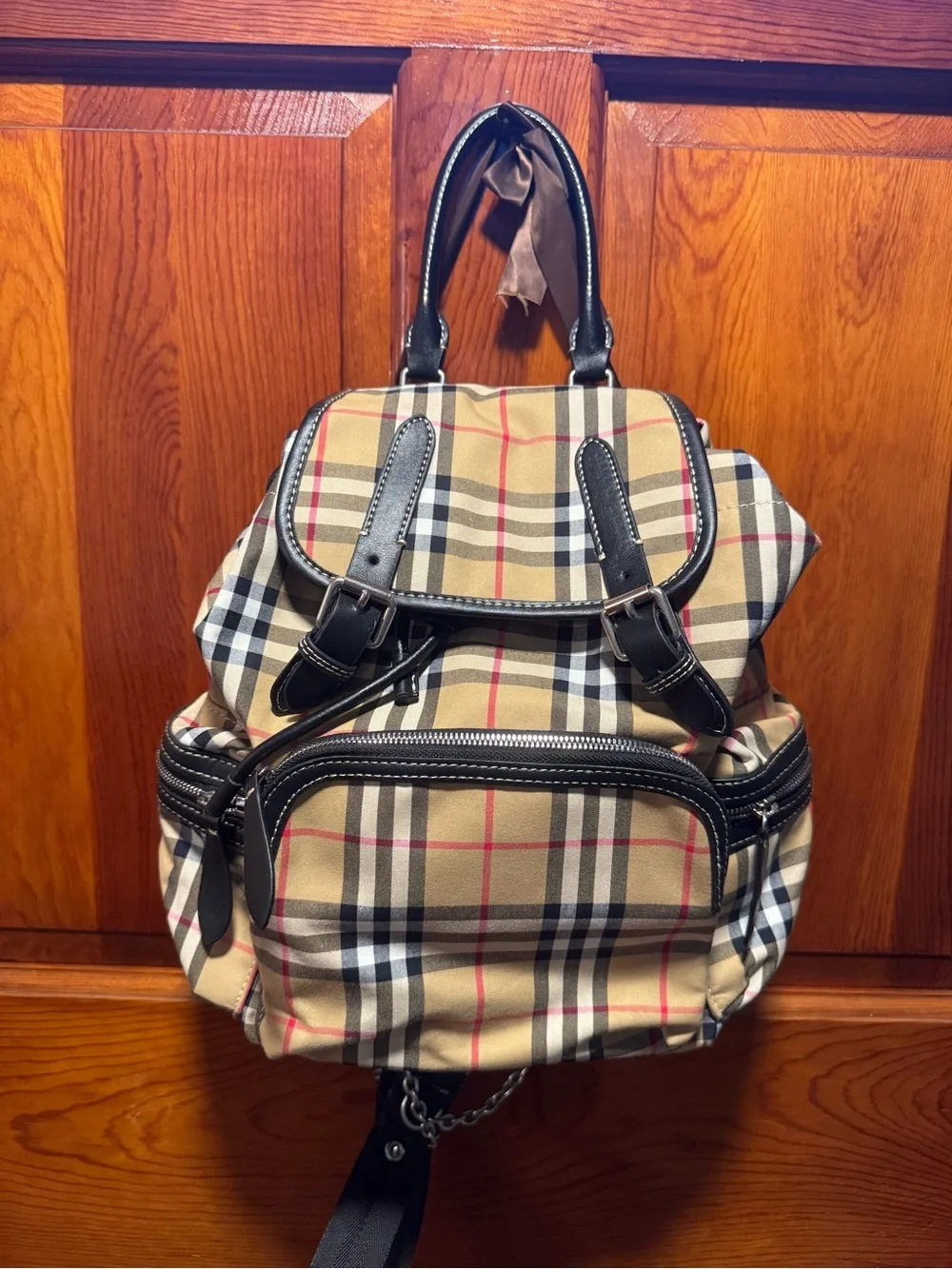 Burberry Nova Check Backpack with black trim and top handle excellent condition