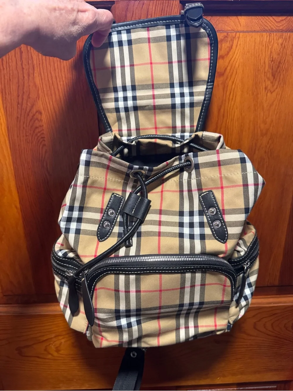 Burberry Nova Check Backpack with black trim and top handle excellent condition